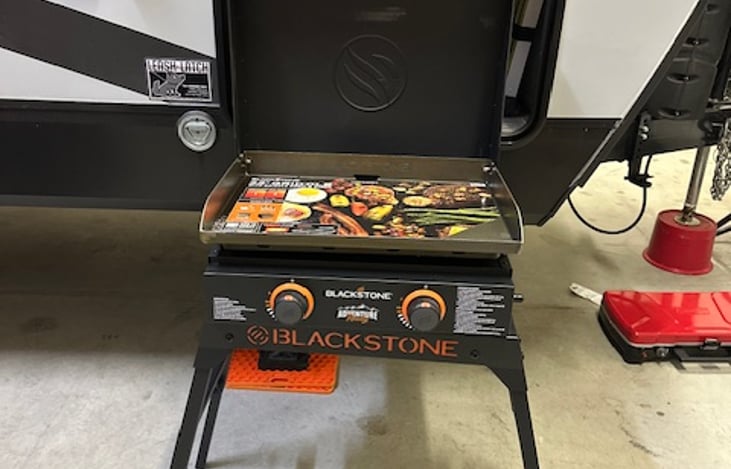 Blackstone 22" Adventure Ready Griddle with stand ready for your favorite campsite meal.