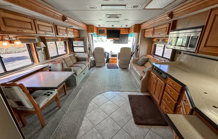 The view of your huge living area from the kitchen forward.