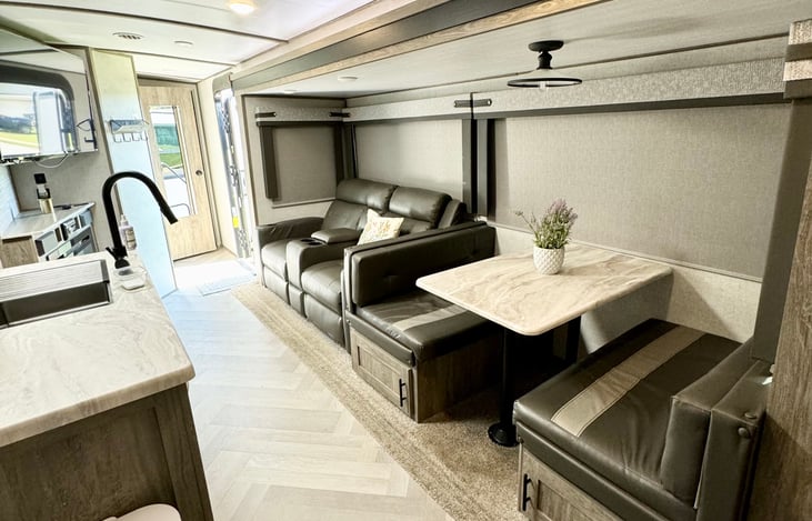 Generously spaced common area with comfortable seating.