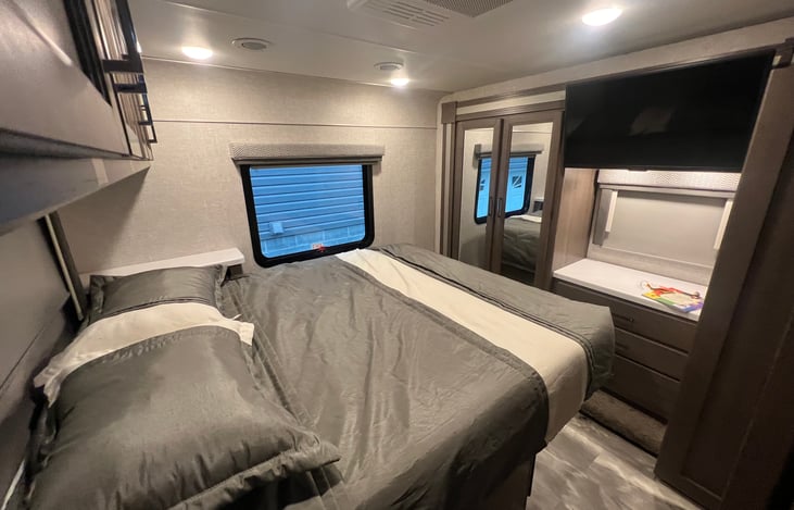 Tempur-pedic queen size bed with night stands and TV