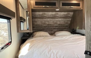 King Bed with Solar Travel Trailer