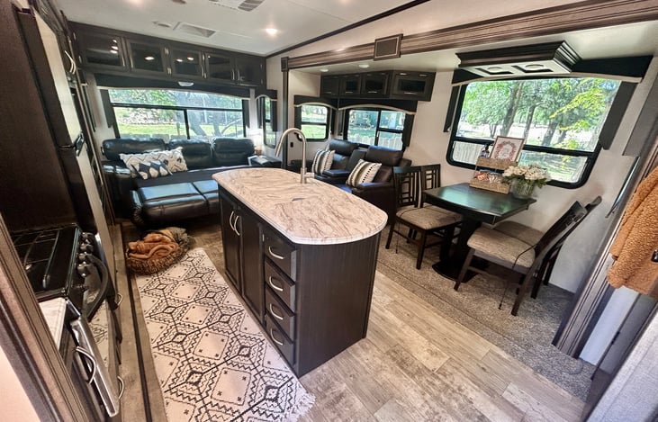 "Welcome Home: Spacious living area with dual opposing slides for maximum room."