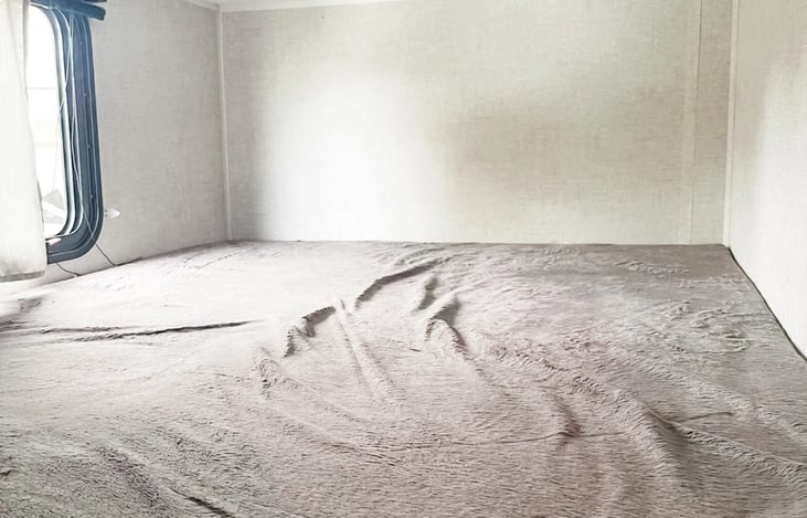 Bottom bunk with window, outlet and light.