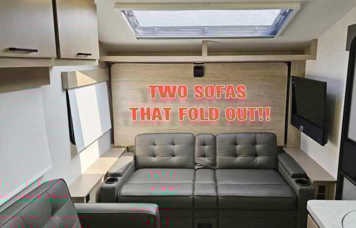 One of two sofas below Ember's Stargazer window.