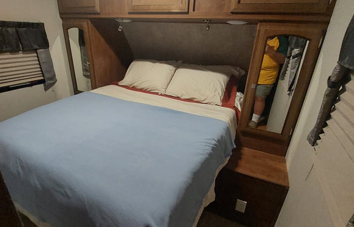 Queen Bed and Closets in bedroom