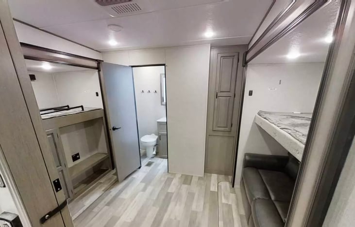 2nd bedroom with dual bunks and pullout sofa.