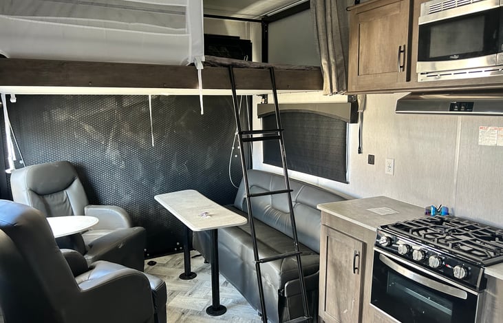 Full size bed that will sleep 2 with a max weight of 300 lbs. A couch that folds out to a bed as well