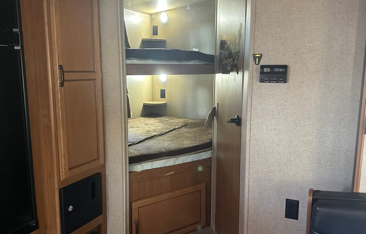 Bunkbeds, each bed a its own window, light, outlet and shelf