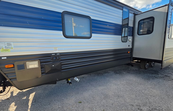 Outdoor shower and Outdoor lighting on back of the camper