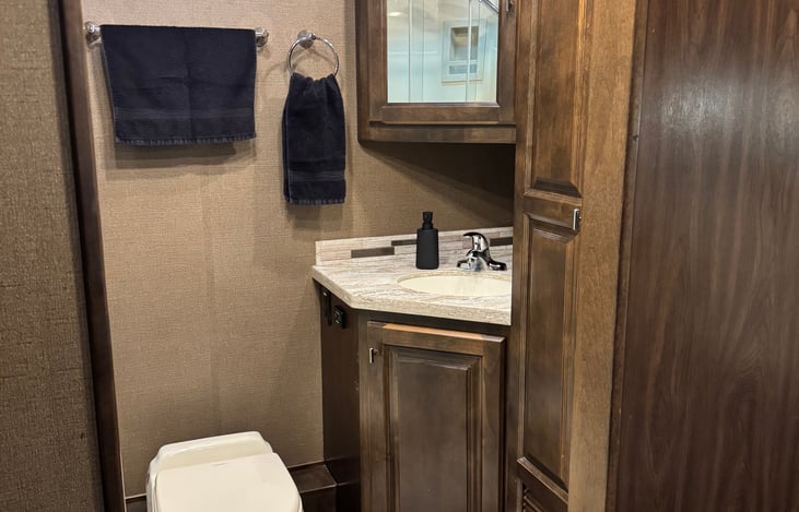 full bath off bedroom also includes plenty of storage and houses the stackable washer/dryer unit