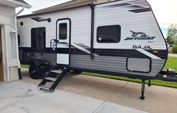 Power awning extends with one button to create instant shade. Built-in exterior speakers let you enjoy music outside, perfect for relaxing or entertaining at camp.