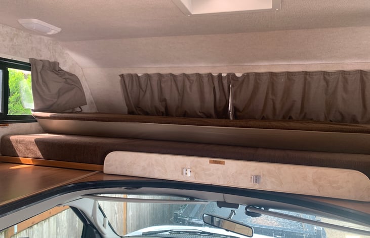 “Mom’s attic” pulls out into a bed.