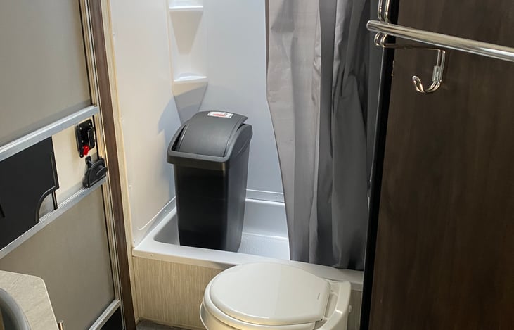 Bathroom with door access to keep the dirt out of the living space!