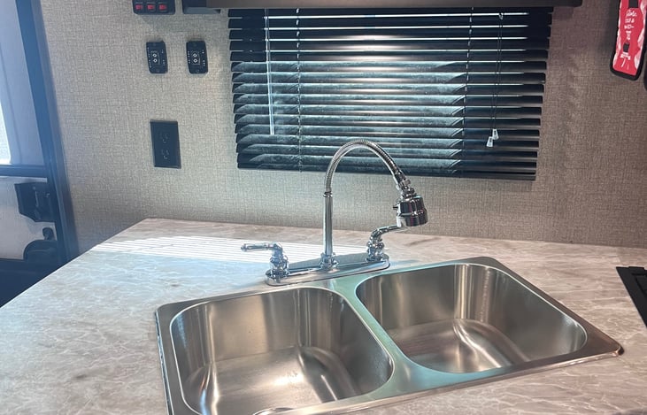 Stainless steel double sink with plenty of room for dishes and pots.
