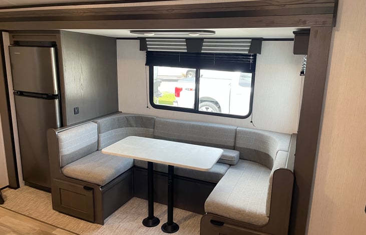 U shaped table that can easily be converted into a twin bed