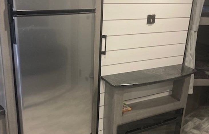 Large Refridgerator/Freezer. Swing out Pantry with Electric Fireplace and TV.