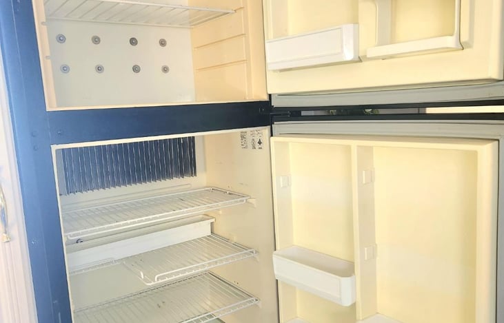 Inside of Freeze/Frig. Lots of space. Also, there is pantry space on the side and under the frig. About 4.5ft in height. Cleaning products are provided, and everything is sanitized before renting.