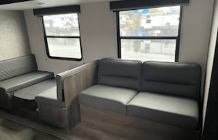 couch and table, both fold into beds