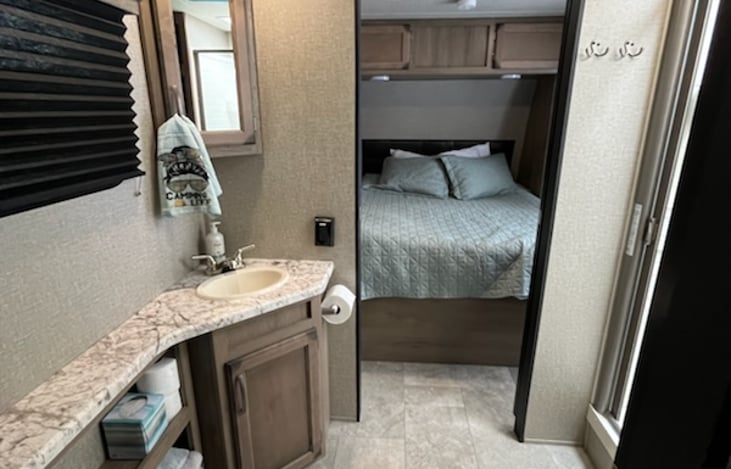 Large bathroom houses clean towels (hand, beach & bath towels and washcloths provided), tissues, toilet paper. First Aid Kit included just in case.