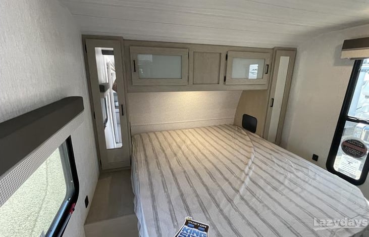 Master bedroom that has a door that closes and locks for privacy.