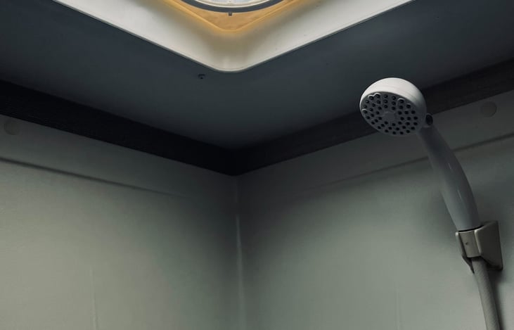 Exhaust fan above the shower.