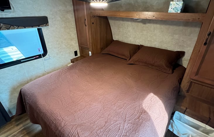Sleep comfortably on the queen bed with a plush 4-inch gel memory foam topper. Enjoy overhead storage, bedside cabinets and a lighted ceiling fan for added comfort.