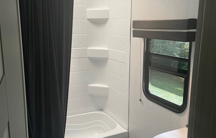 Bathroom includes a tub/shower combo.