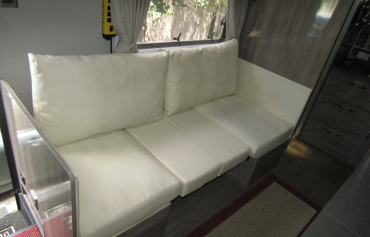 Fold down bed or couch.