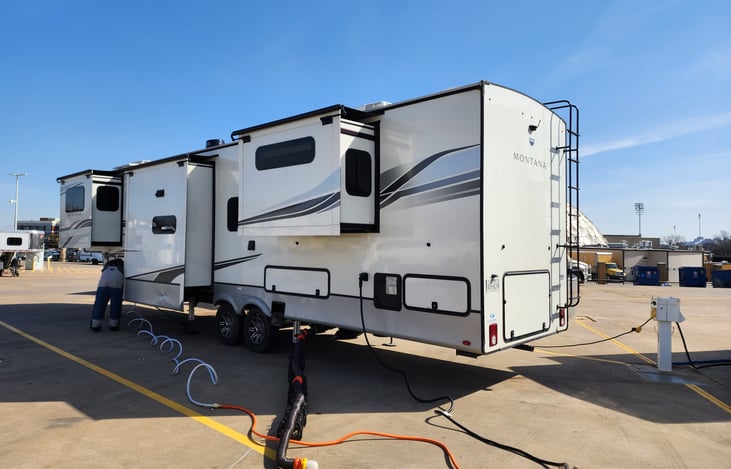 3 slides on left side and large storage below is a huge plus. I carried a 12.5 kayak in the belly.