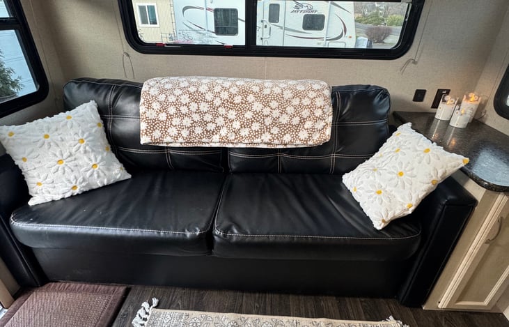 COMFORTABLE COUCH THAT CONVERTS TO A BED