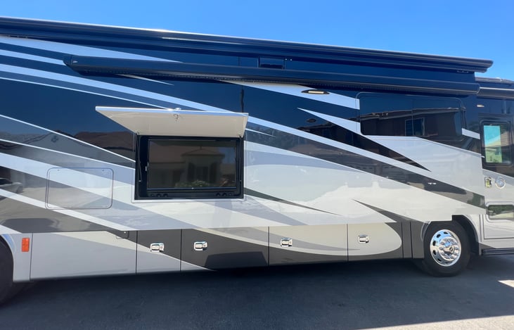 Outside smart TV and DVD player with sound bar(can use with Bluetooth music also)
Awning has LED lights under