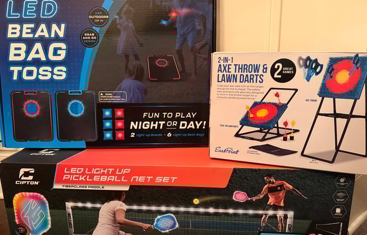 Fun Games for the family: Cornhole, glow in the dark pickleball and darts/ ax throwing. Tons of board games