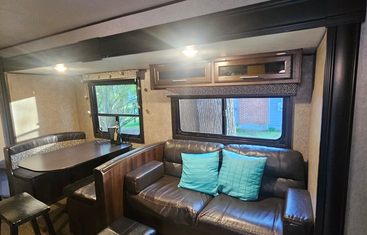 The couch jack knifes into a bed.  The dining table is also a bed