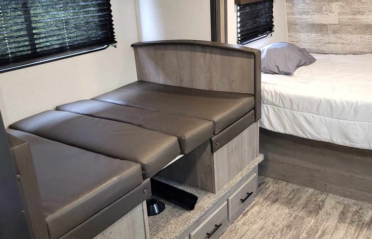 Kitchen table converts into a full size bed.