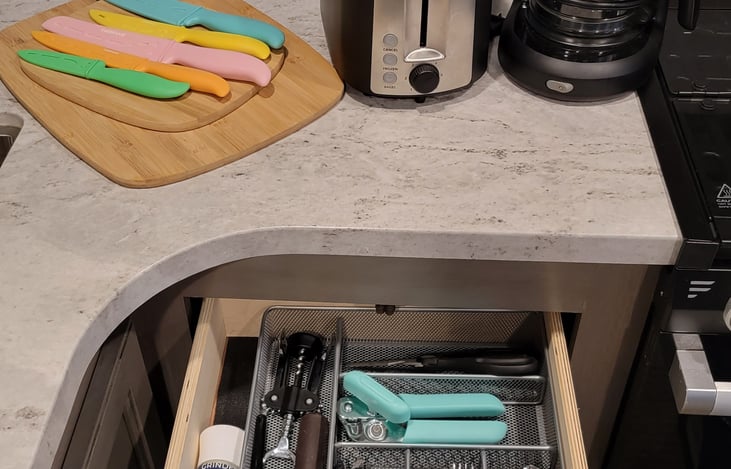 5 cup coffee maker with gold foil filter, toaster, knives and silverware