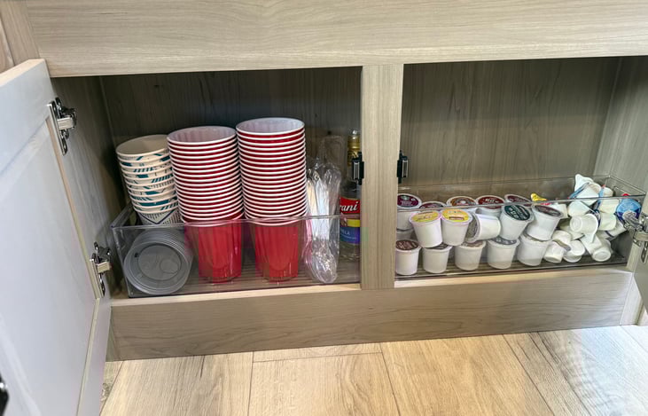 Keurig Coffee maker and pods, along with creamers and cups. Also has a milk frother and vanilla for some good lattes.