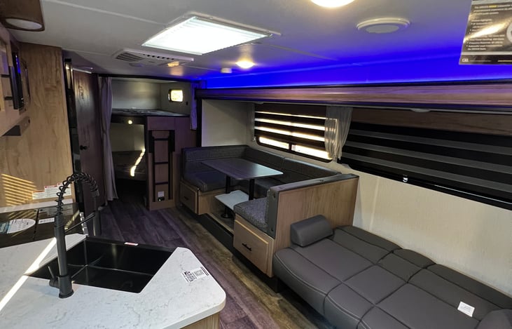 Living room, sofa and dinette both turn into beds