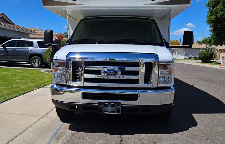 Front of RV. Adjustable side mirrors