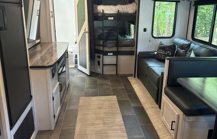 Both bunk beds are upgraded with 4” foam toppers.
