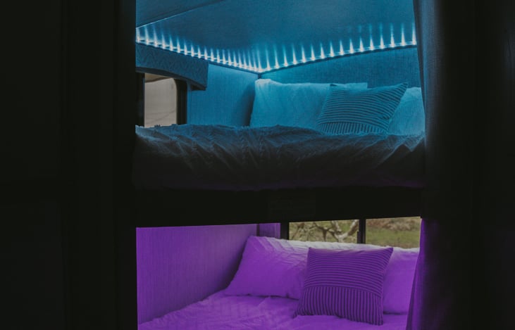 Double bunk beds with custom LEDs. Change them to any color you want!