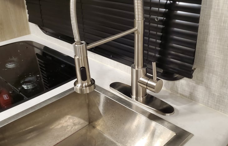 Big sink with new residential faucet