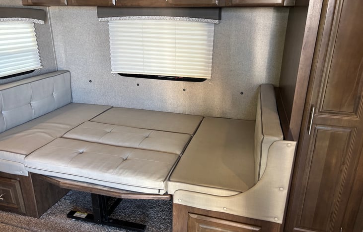 The dinette converts into a full size mattress.