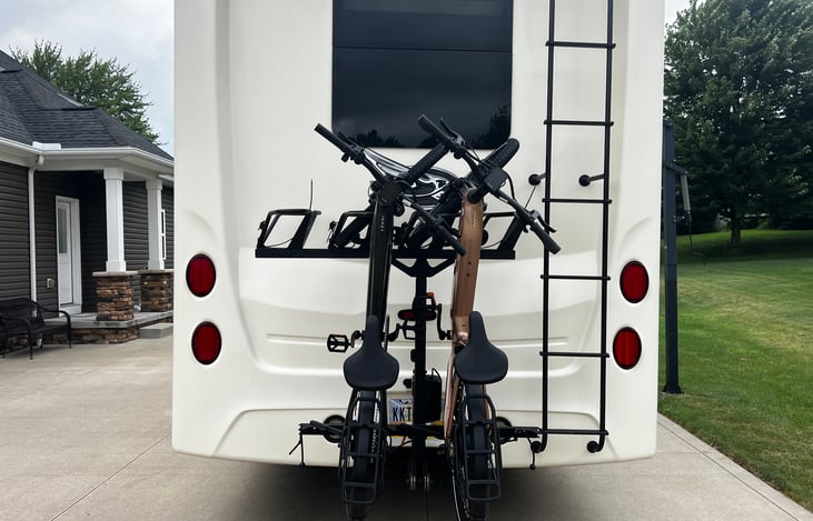 Optional Revlrax shown with optional Aventon level 3 E Bikes. Perfect for exploring your campground or local sites! Up to 70 mile range per charge