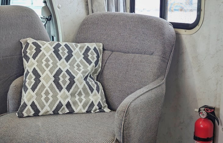 Moms will love snuggling up in this chair with a blanket for some quiet reading time while the kids romp around outside in the woods with Dad.