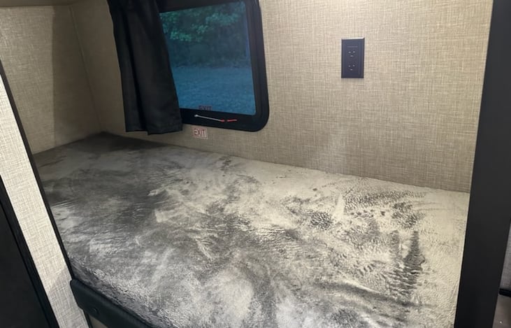 Bunk with outlet and window