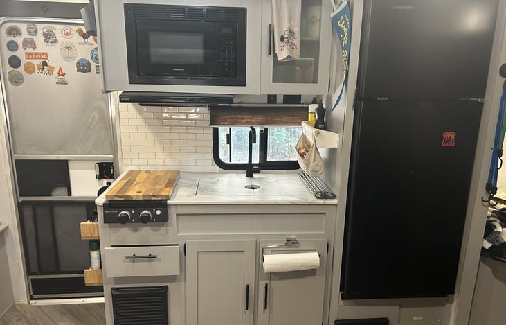Indoor kitchen and fridge