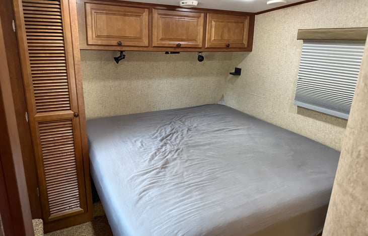 King sized memory foam bed with closet.