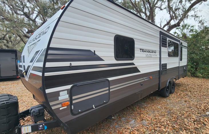 Front left corner.  Slide out is not in use.