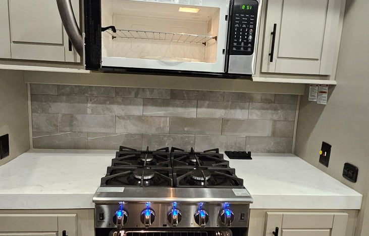 Convection microwave and 4 burner stove