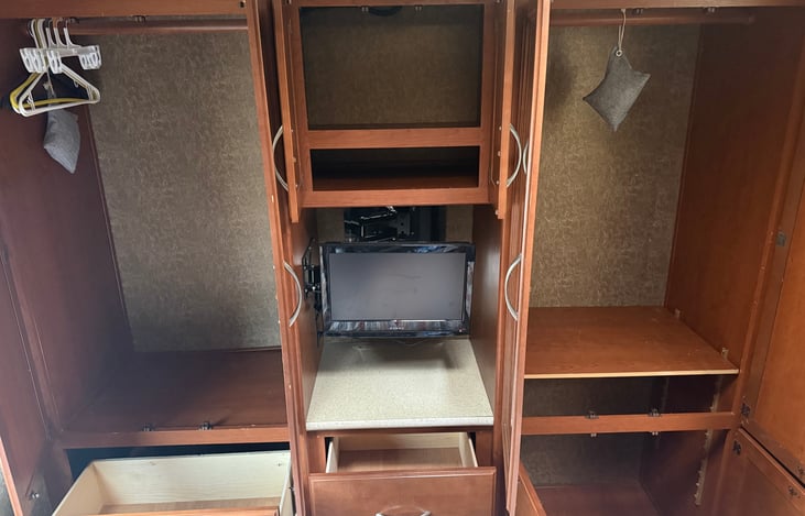 Jack and Jill closet with four pullout drawers